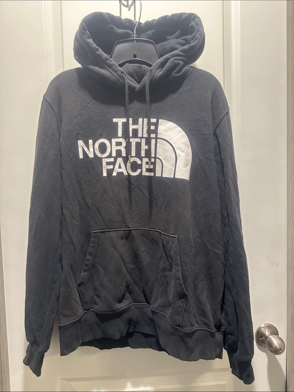 The North Face Black Hoodie with Large White Logo
